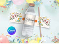 Personalized water bottle with floral labels and 'Riley is turning fifty' text, surrounded by colorful confetti.