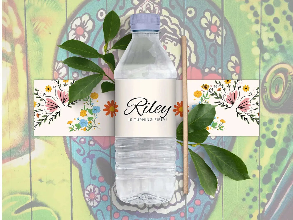Water bottle with 'Riley is turning fifty' label on a colorful, patterned background