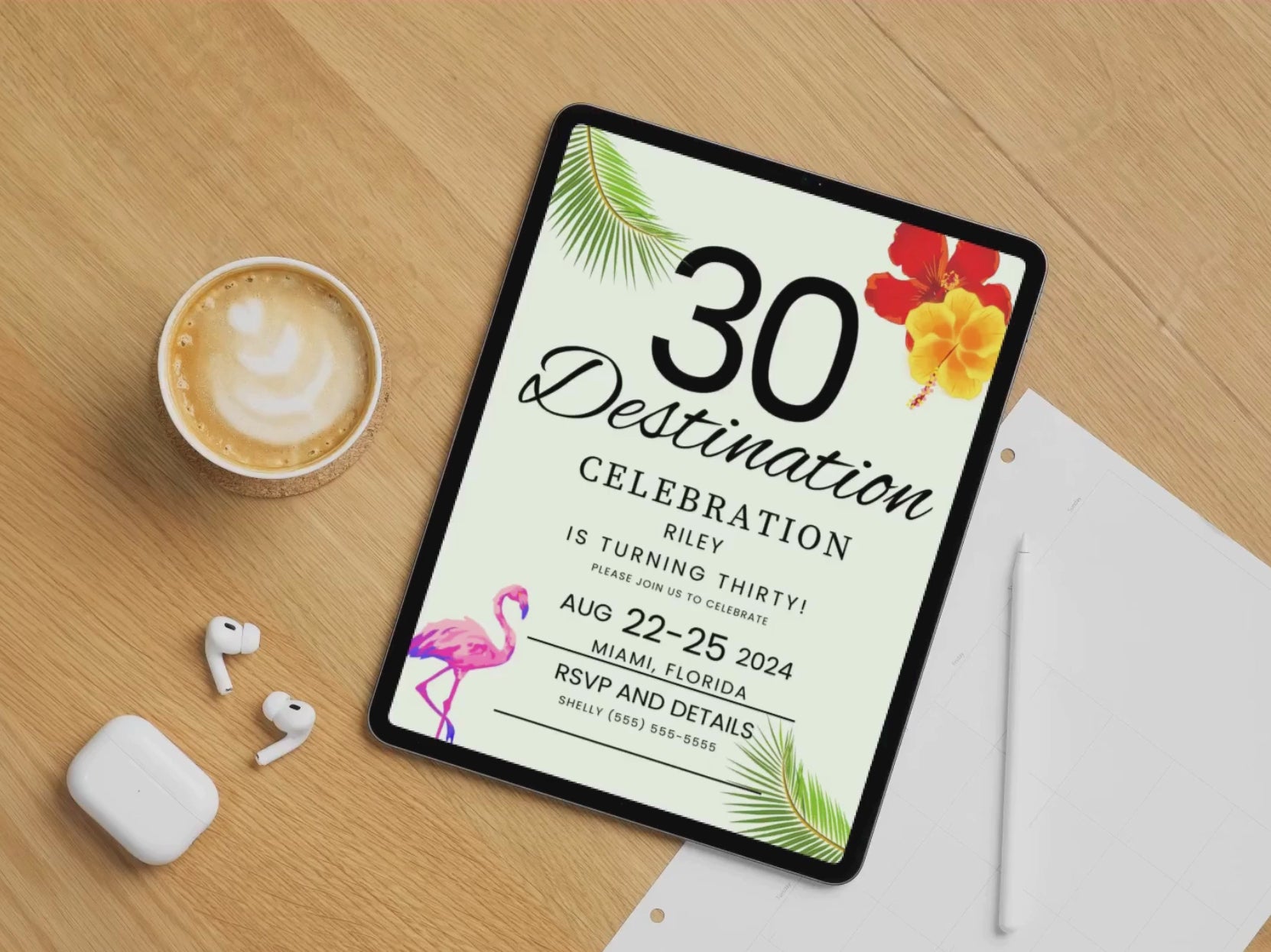 Invitation tempate with 30 Destination text and tropical floral desigin on wood background with cup of latte and airpods. 